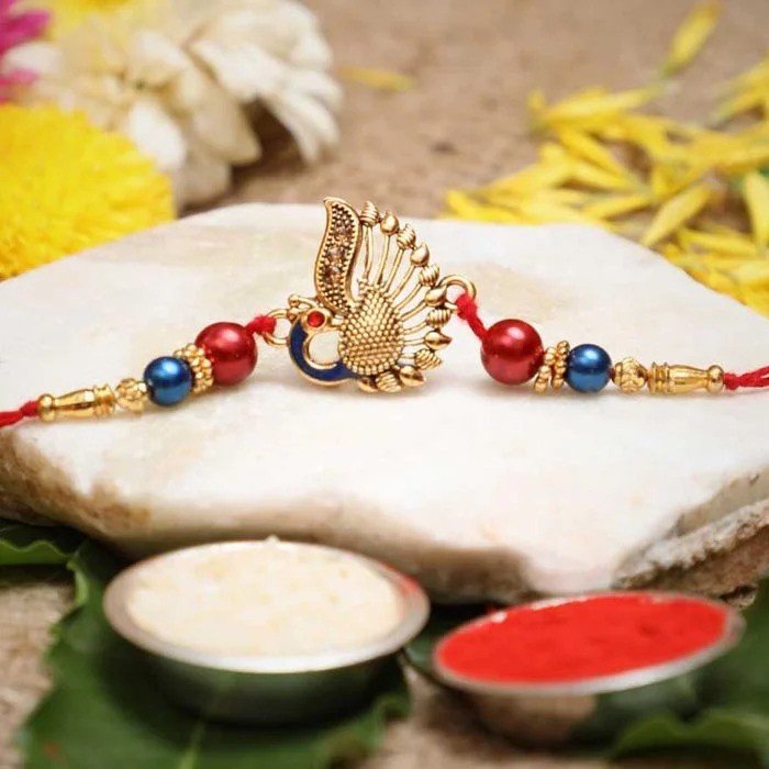 Designer Peacock Rakhi With Roli Pack